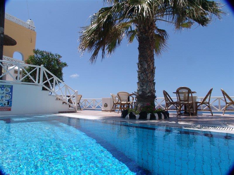 Cliff Side Suites Тира Экстерьер фото